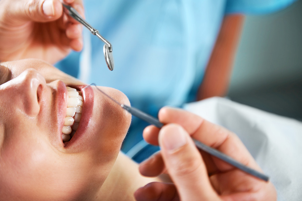 Here’s Why You Have a Loose Tooth and What To Do About It